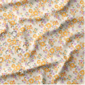 TISSU IMPERMEABLE FLEURI JAUNE VIOLET