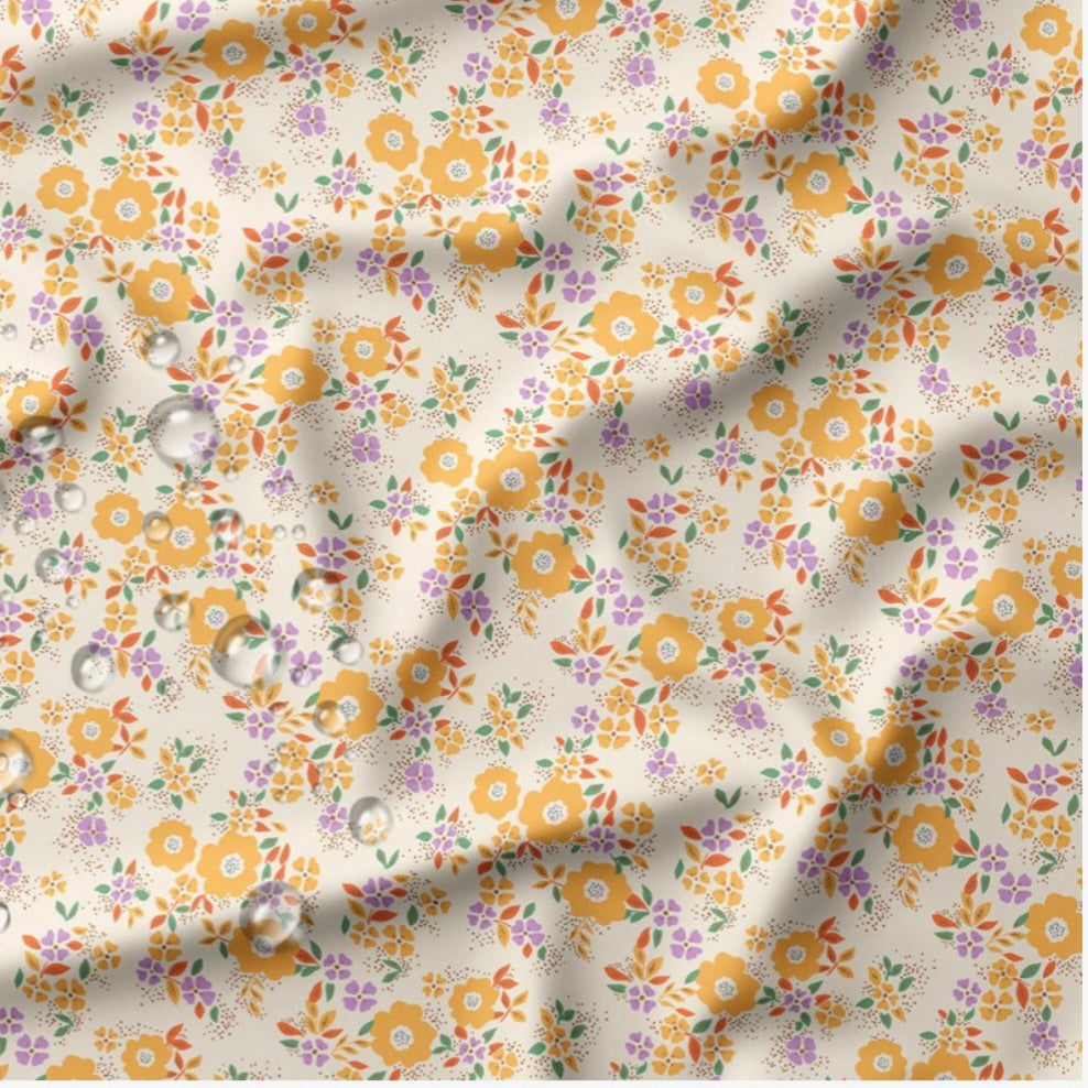 TISSU IMPERMEABLE FLEURI JAUNE VIOLET