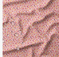 TISSU IMPERMEABLE FLEURI ROSE ET ORANGE